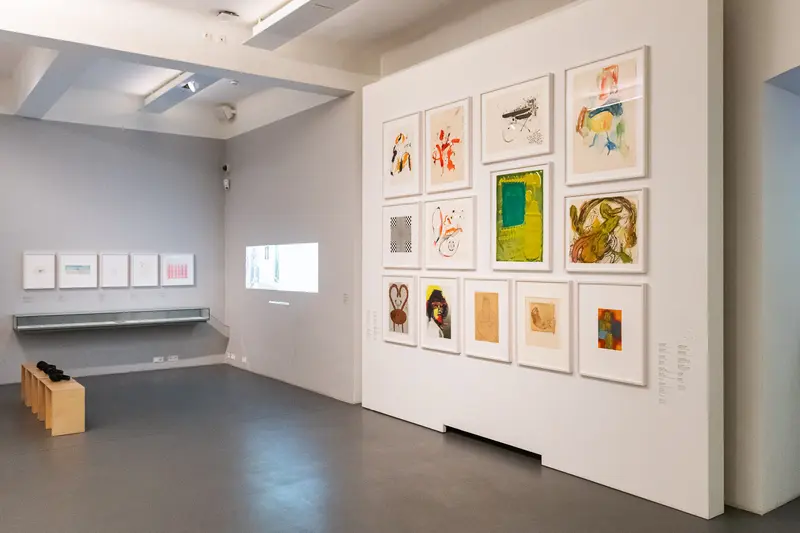 Gallery Wall Display of Diverse Artworks at Dom Museum Vienna Exhibition