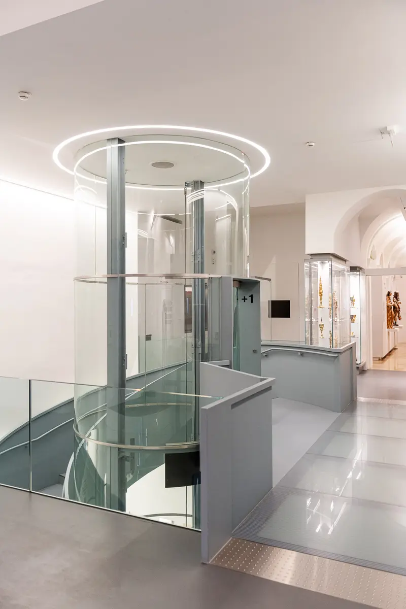 Modern Glass Elevator Installation with Minimalist Architectural Design