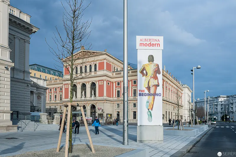 Albertina Modern Entrance Signage with Urban Architectural Backdrop in Vienna