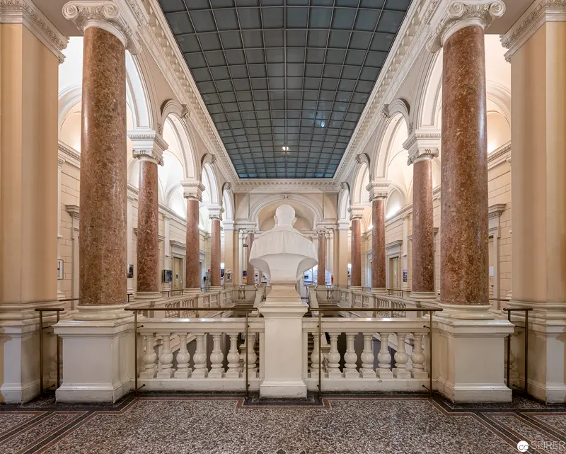 Neoclassical Interior with Marble Columns and Sculptural Architectural Space