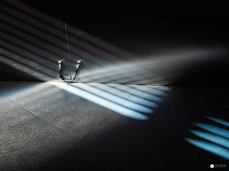 Abstract Light Study: Industrial Space with Geometric Shadow Projection