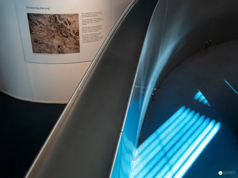 Archival Display of Geological Map with Abstract Blue Industrial Lighting