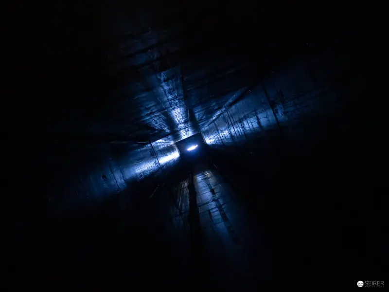 Luminous Cruciform Tunnel Vision: Abstract Architectural Light Projection
