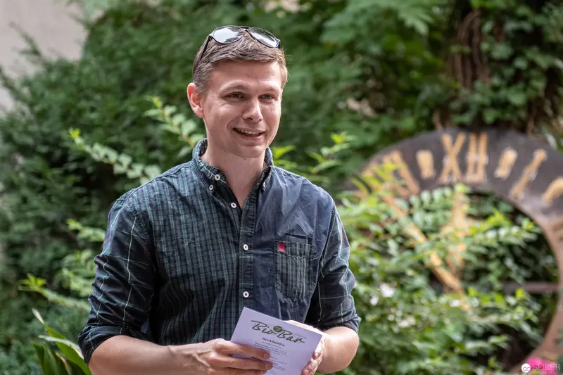 Smiling Young Man with Sunglasses at Stadthalle in Vienna Green Space