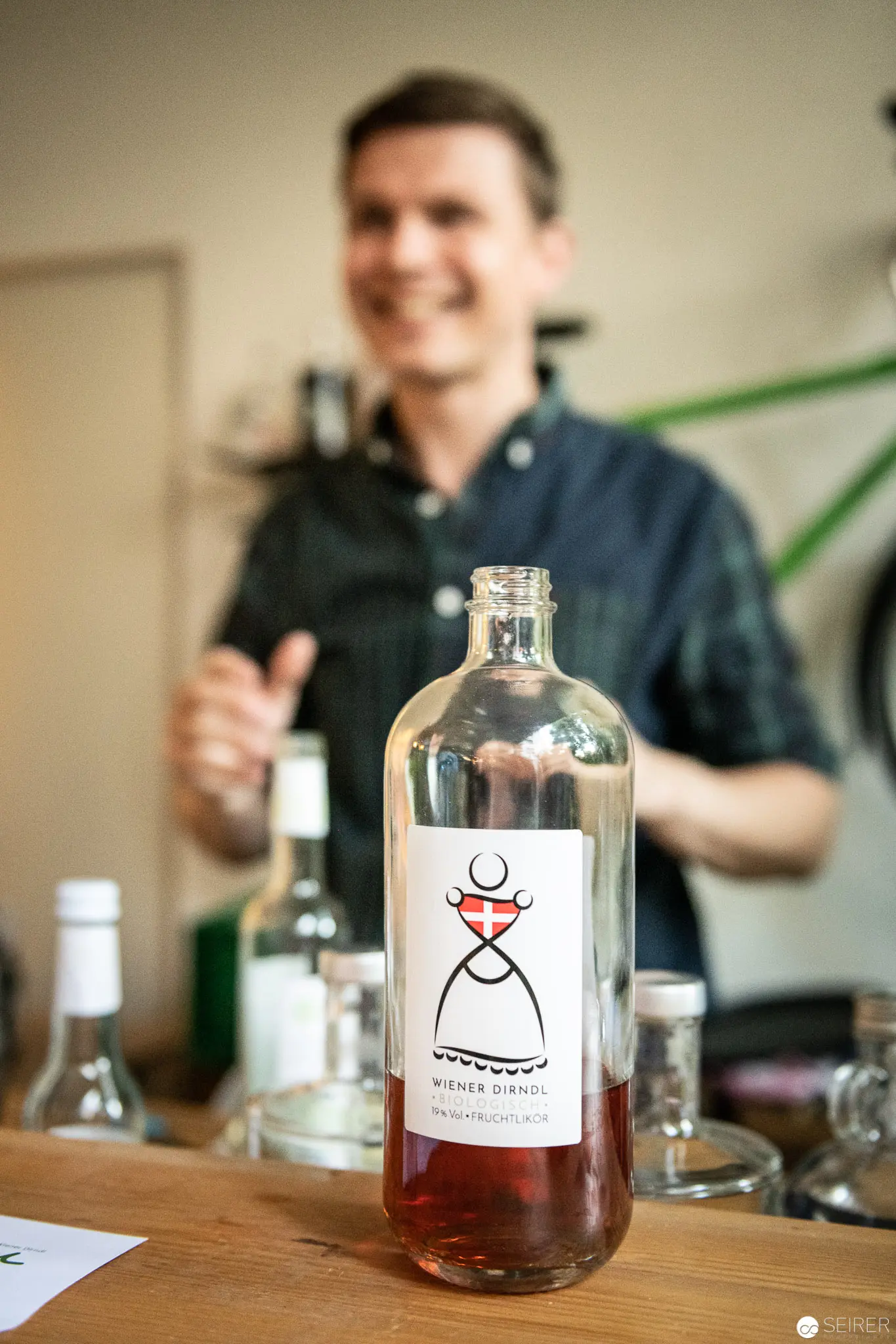 Boutique Artisan Spirit Bottle with Distinctive Logo at Stadthalle Wien Workshop