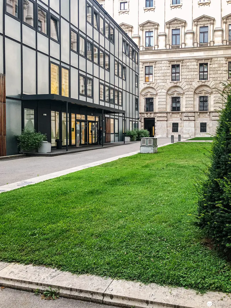 Modernist Urban Architecture: Contrasting Facade Styles in Historic City Center