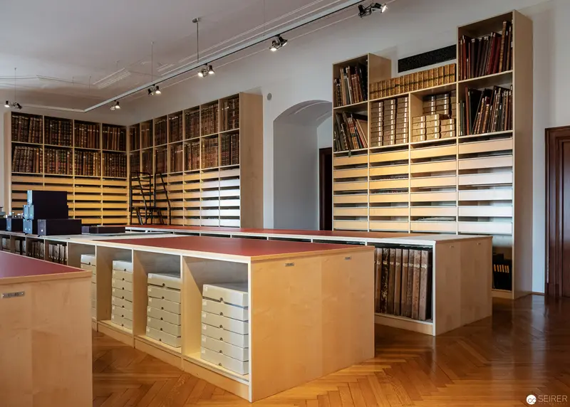 Interior of Bildarchiv der Nationalbibliothek Archive with Wooden Book Shelves and Research Stations