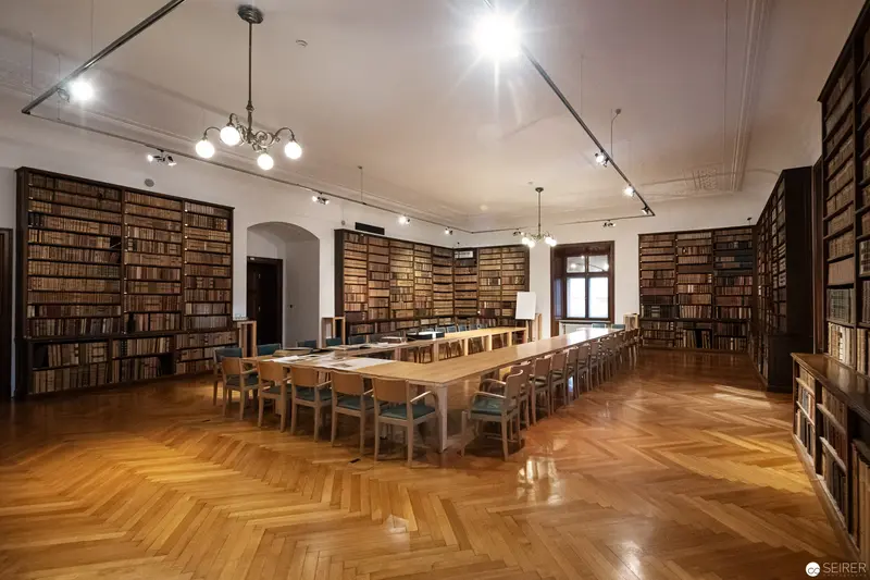 Historic Library Reading Room with Herringbone Floor and Extensive Book Collection