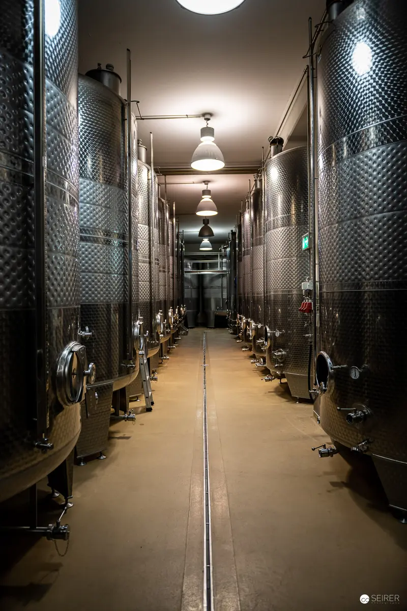 Domäne Wachau Winery: Stainless Steel Fermentation Tanks in Symmetrical Interior