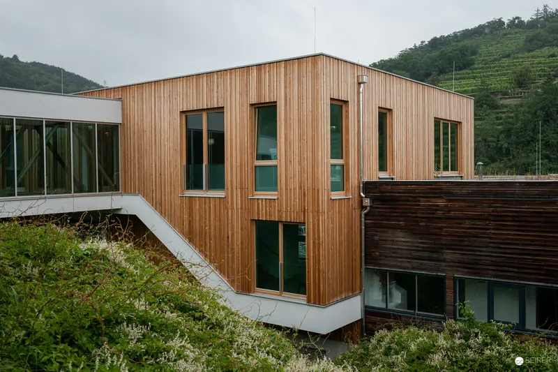Modernist Wooden Architecture Nestled in Terraced Mountainous Landscape