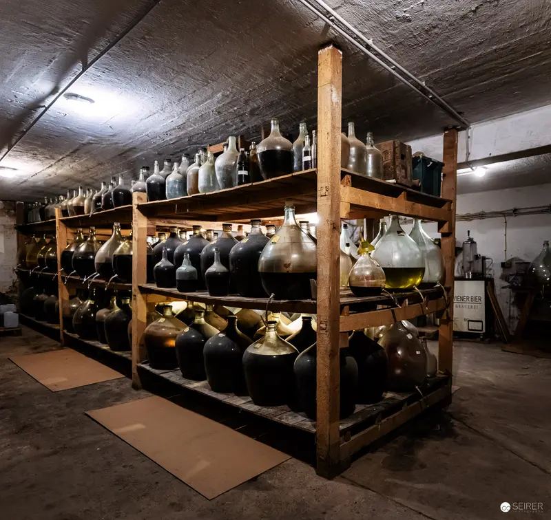 Ceramic Demijohns and Glass Vessels in Artisanal Vinegar Storage Facility