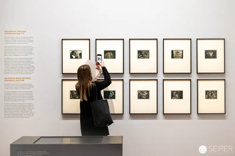 Visitor Photographing Monochrome Art Exhibition at Albertina Museum