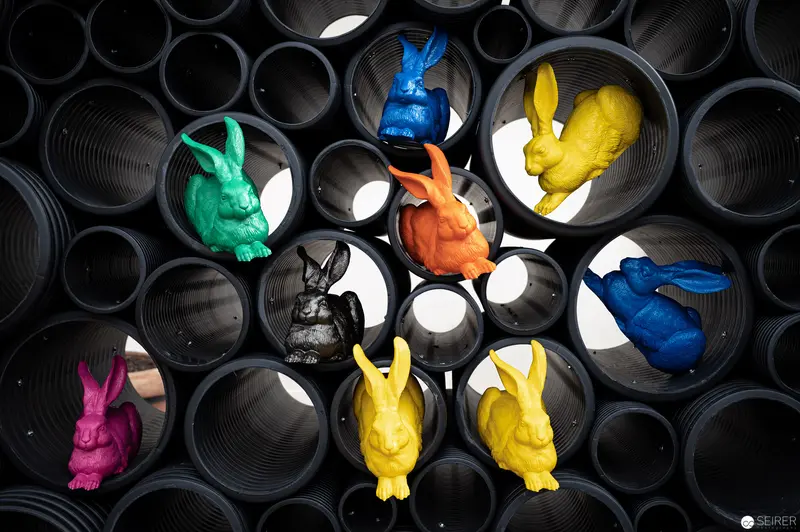 Colorful Rabbits Nestled in Circular Geometric Composition