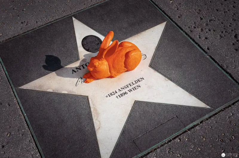 Orange Rabbit Sculpture Resting on Hollywood Walk of Fame Star