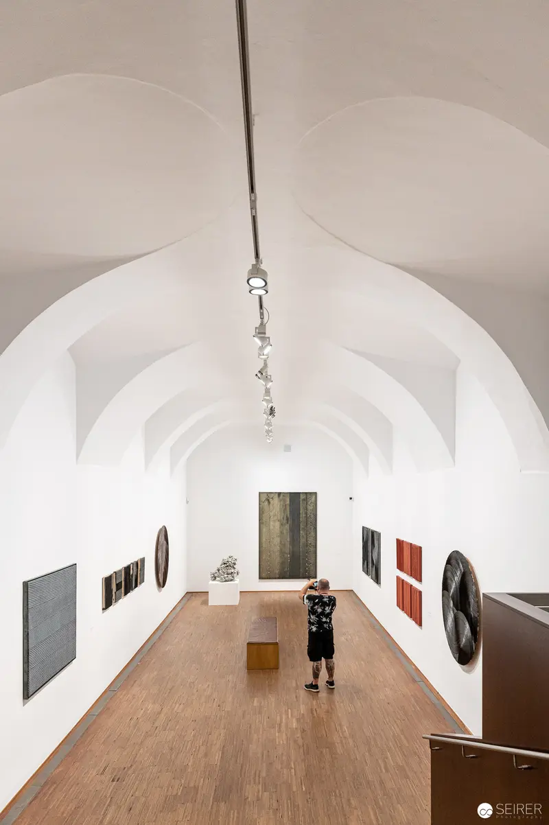 Jakob Gasteiger's "Post-Radikale Malerei" Exhibition at Albertina, Visitor Contemplating Artworks