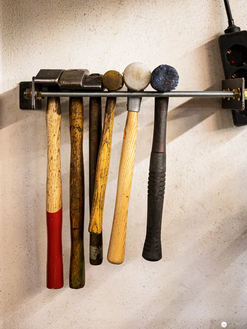 Precision Metalworking: Hammers and Mallets on Workshop Mounting Rack