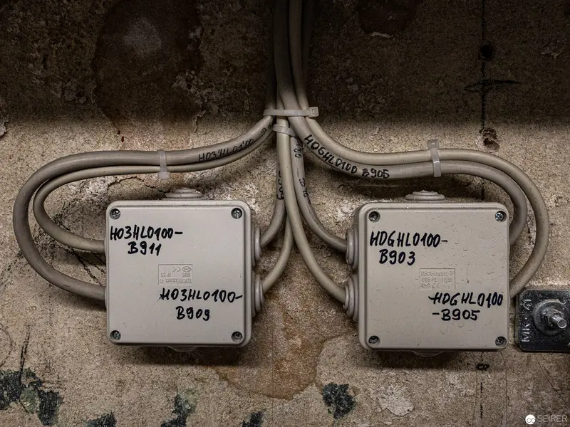 Industrial Electrical Junction Boxes with Weathered Wall and Complex Wiring