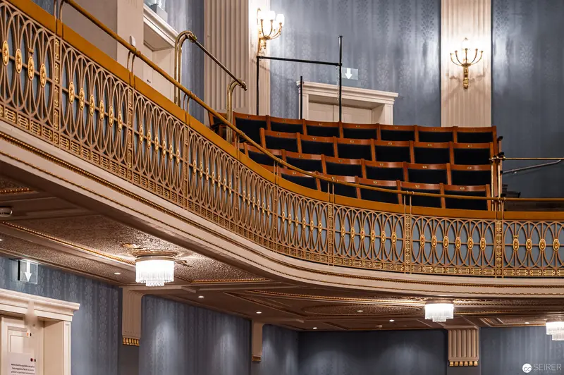 Ornate Balcony Interior with Curved Railing and Tiered Seating at Konzerthaus Wien