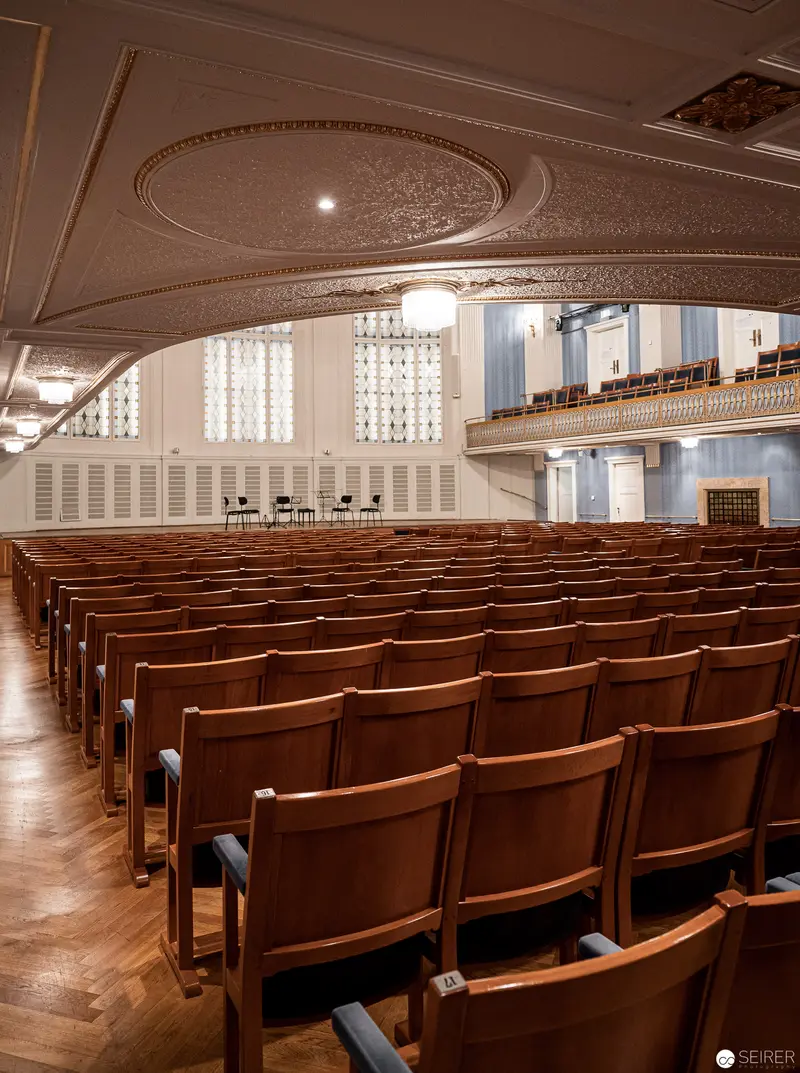 Empty Concert Hall Interior with Ornate Ceiling at Konzerthaus Wien