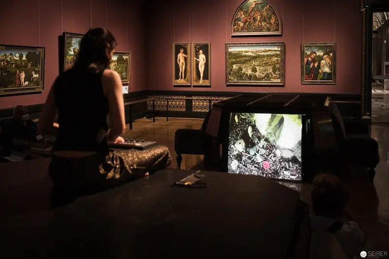 Performance Ganymed: Silhouetted Viewer Contemplates Artwork at Kunsthistorisches Museum Wien