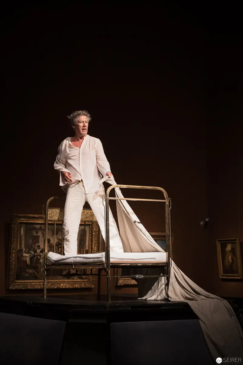 Performance Ganymed: Solitary Figure on Elevated Stage at Kunsthistorisches Museum Wien