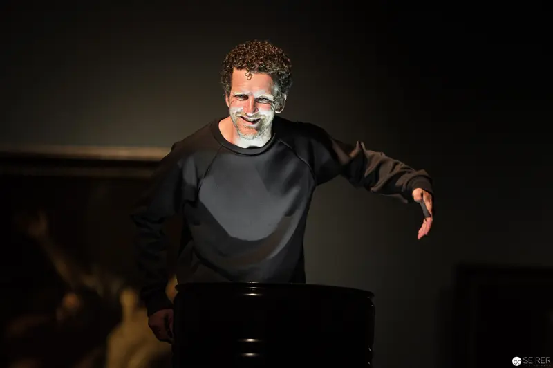 Performer in Black Illuminated During Ganymed Performance at Kunsthistorisches Museum Wien