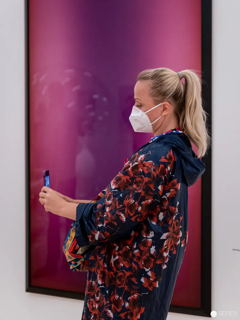 Woman in Floral Jacket with Face Mask Viewing Exhibition at Landesgalerie Niederösterreich