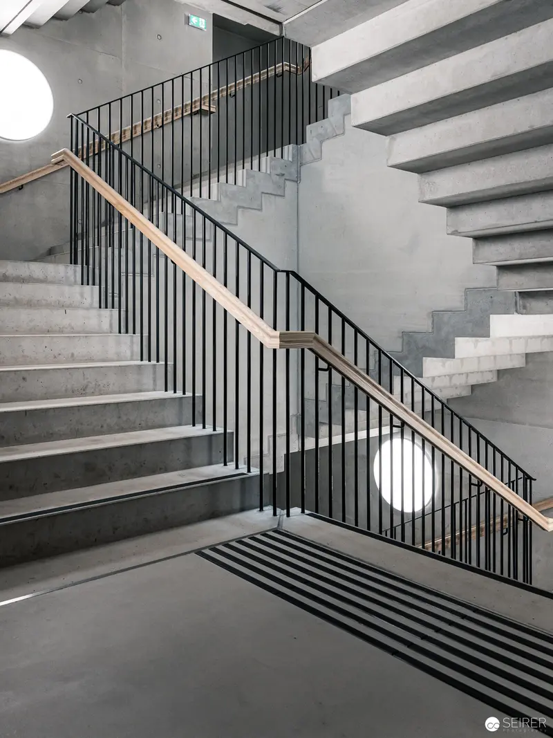 Modernist Concrete Staircase with Geometric Vertical Circulation and Minimalist Design