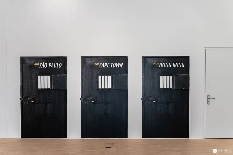 Comparative Urban Representation through Prison Door Metaphors at Exhibition