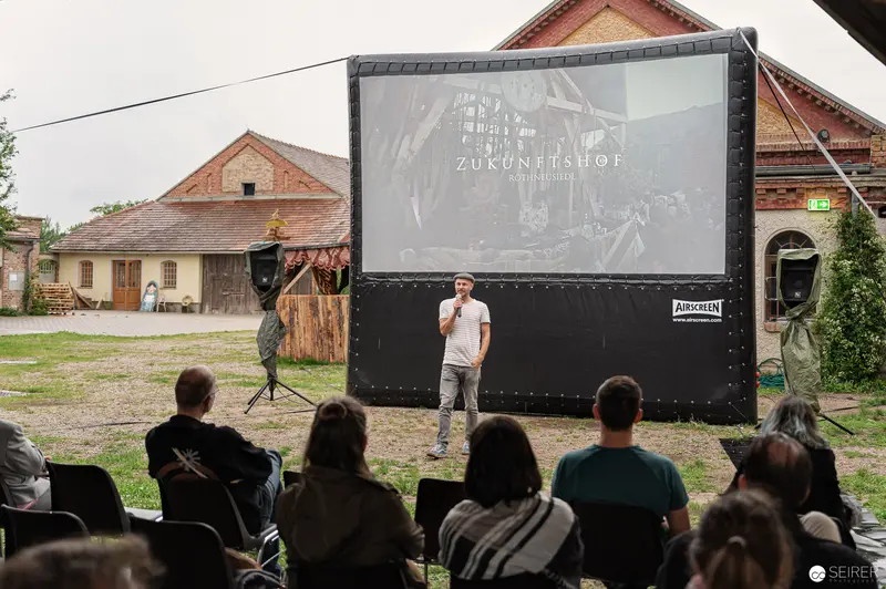 Zukunftshof Rothneusiedl Documentary Screening amid Rural Architecture