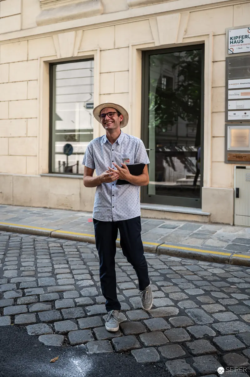 Summer in Vienna: Casual Urban Explorer on Cobblestone Street