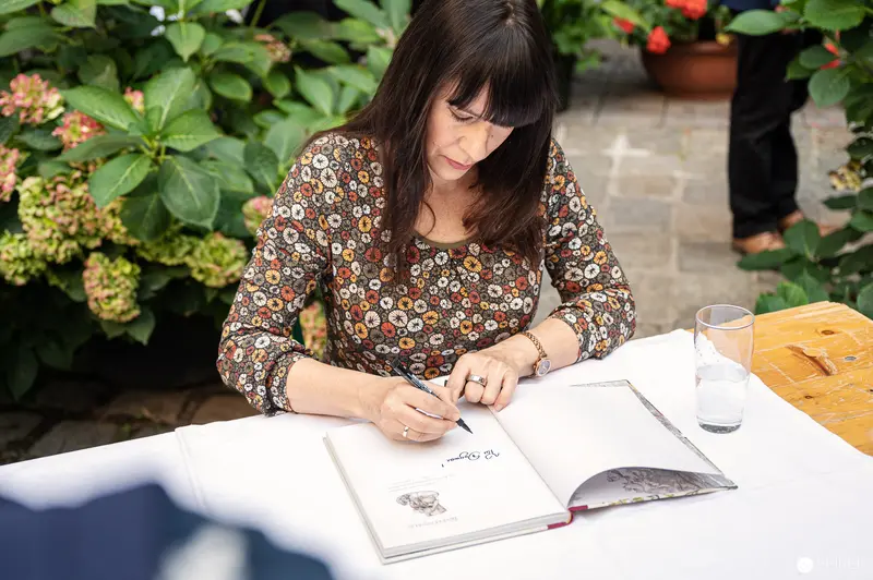 Jolanda Richter Signing Book at Deutschordenshaus during "Wiesenwald" Reading