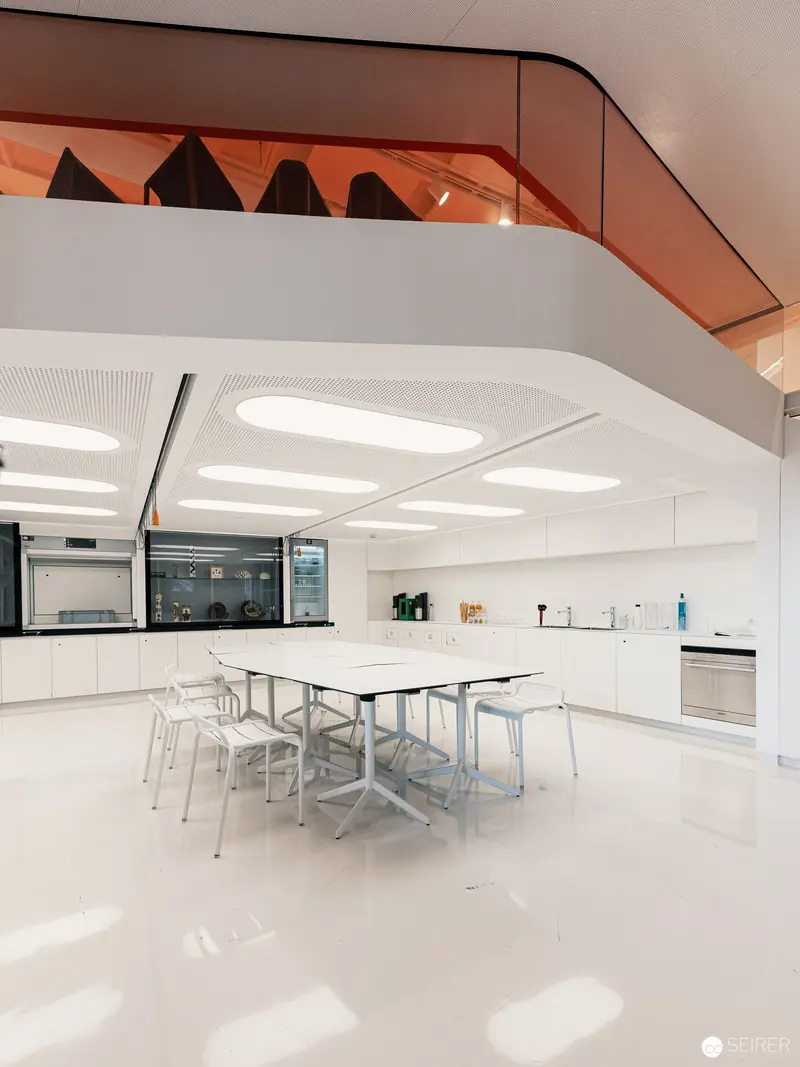 Minimalist White Interior of Deck 50 Innovation Space at Natural History Museum Vienna