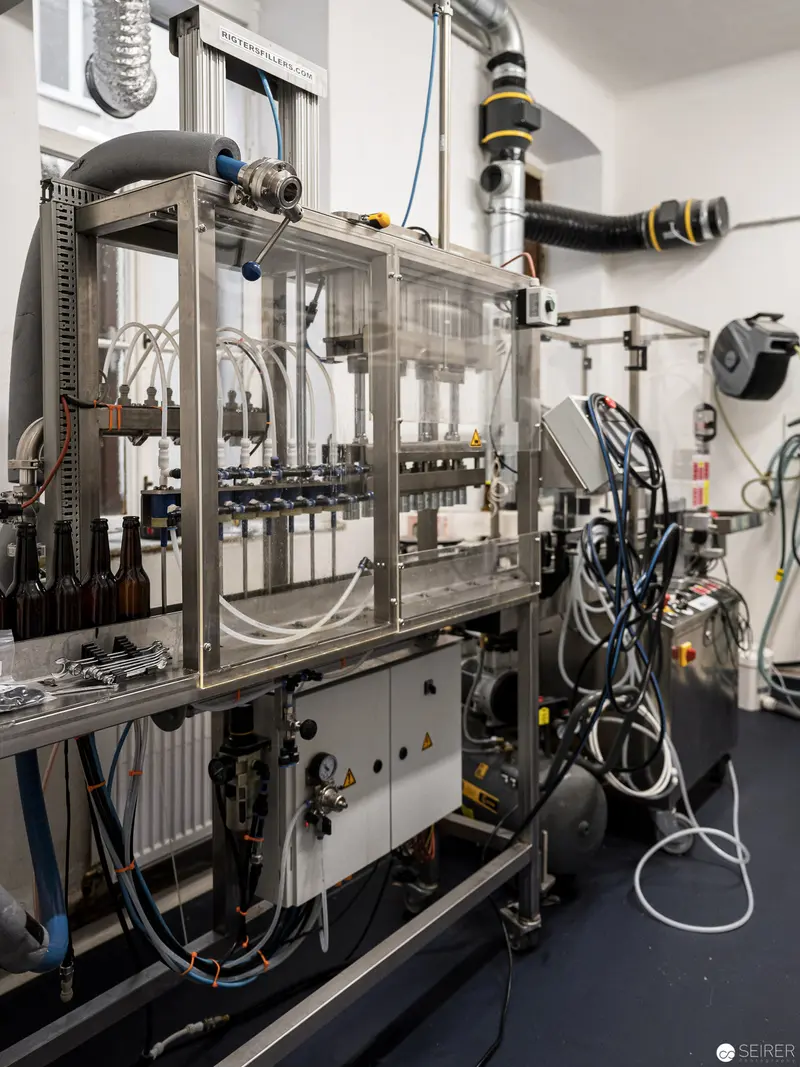 Industrial Bottling Machinery at Research Facility with Complex Mechanical Systems