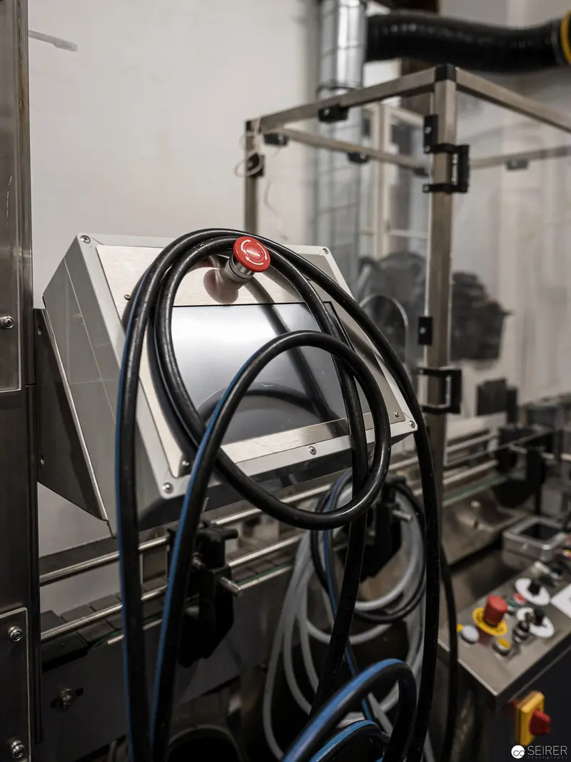 Industrial Machine Cables and Control Panel in Manufacturing Environment