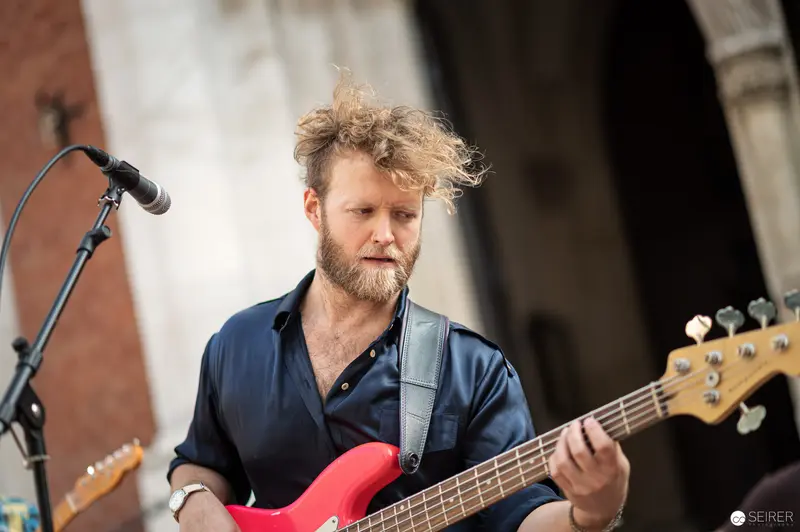 Bass Guitarist Performing at Musik Befreit Abschlusskonzert in Wieden