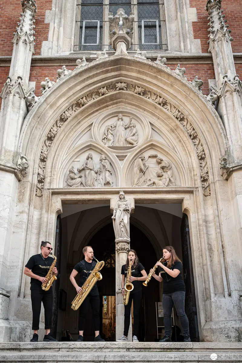 Aureum Saxophone Quartet Performing at Gothic Church Entrance