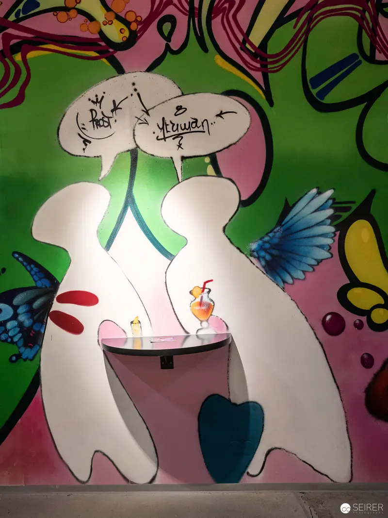 Surreal Abstracted Figures with Butterfly in Colorful Expressionist Composition