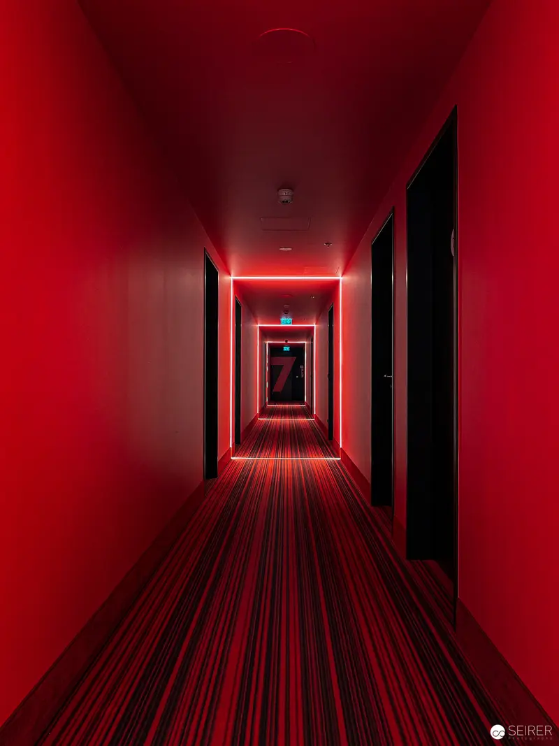 Crimson Corridor: Intense Architectural Perspective in Monochromatic Red