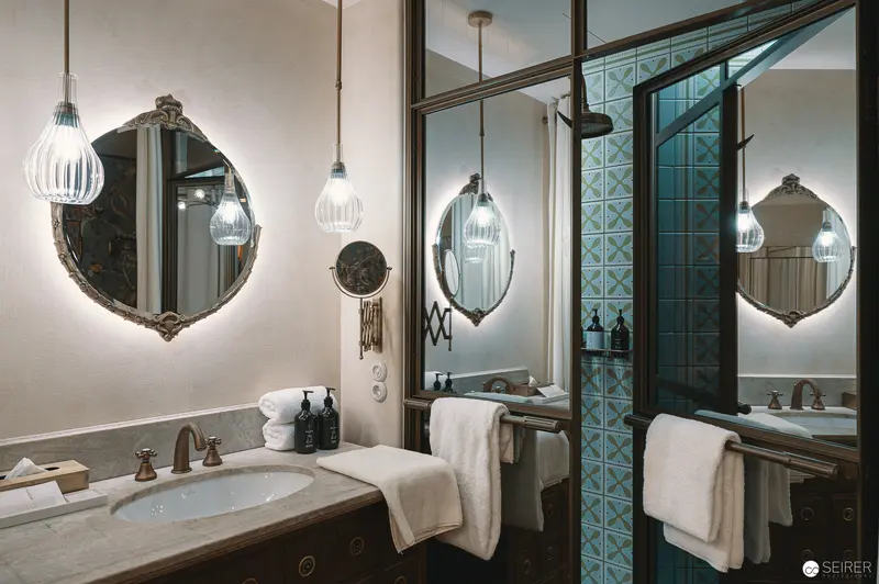 Luxury Bathroom Interior at Hotel Motto, Vienna with Ornate Mirrors and Pendant Lights