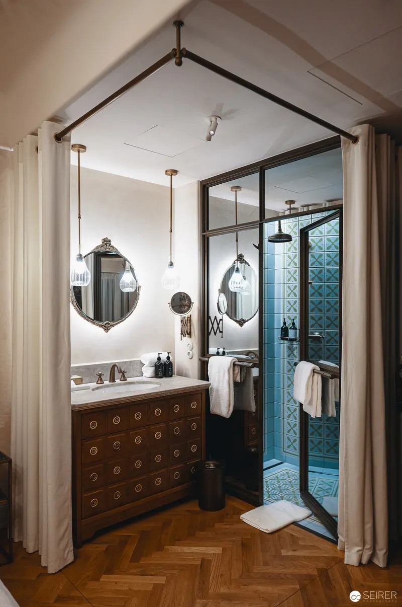Vintage Bathroom Design at Hotel Motto, Vienna with Herringbone Floor