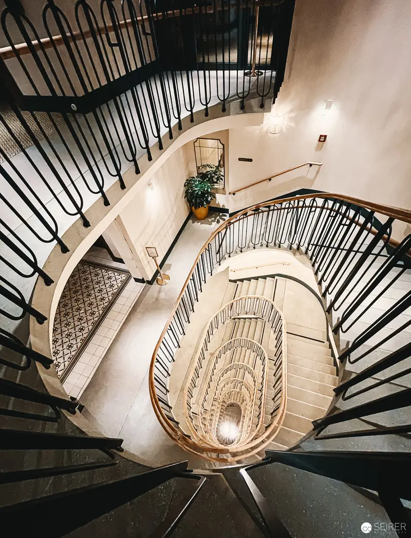 Spiral Staircase at Hotel Motto: Geometric Architectural Descent in Vienna