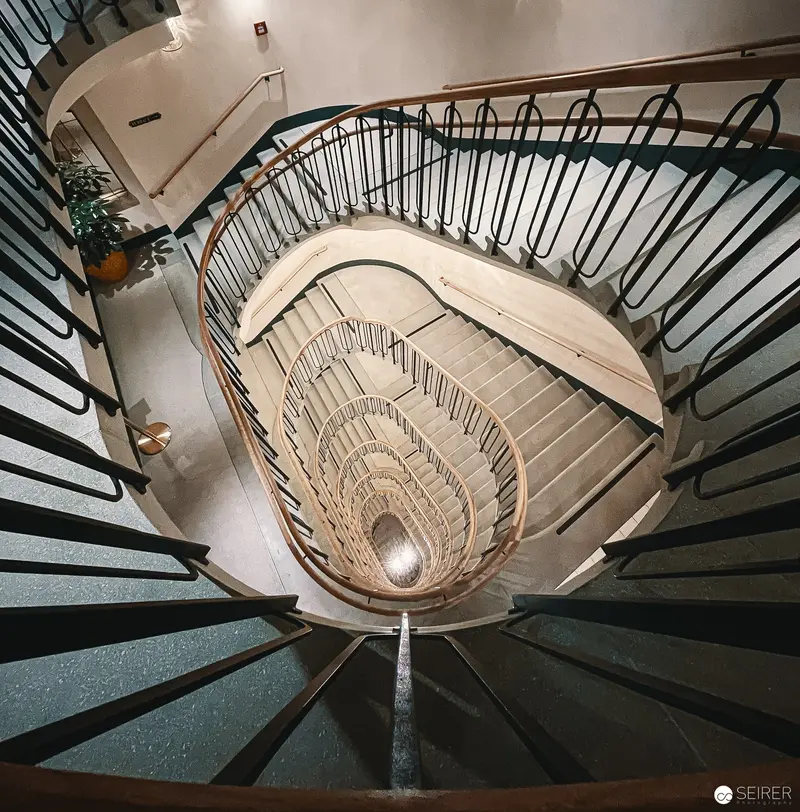 Spiral Staircase at Hotel Motto: Architectural Photography Revealing Geometric Elegance