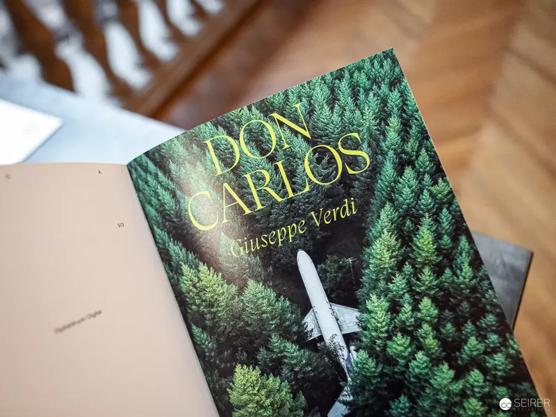 Don Carlos Opera Score by Verdi Amid Verdant Forest Landscape