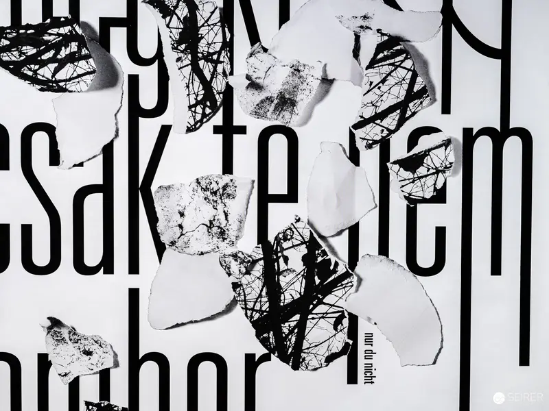 Fragmented Typography: Deconstructed Poster Design with Layered Text and Textures