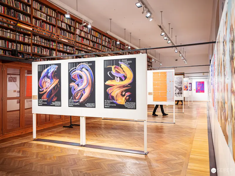 "100 Best Posters" Exhibition at MAK Vienna: Graphic Design Display with Abstract Prints