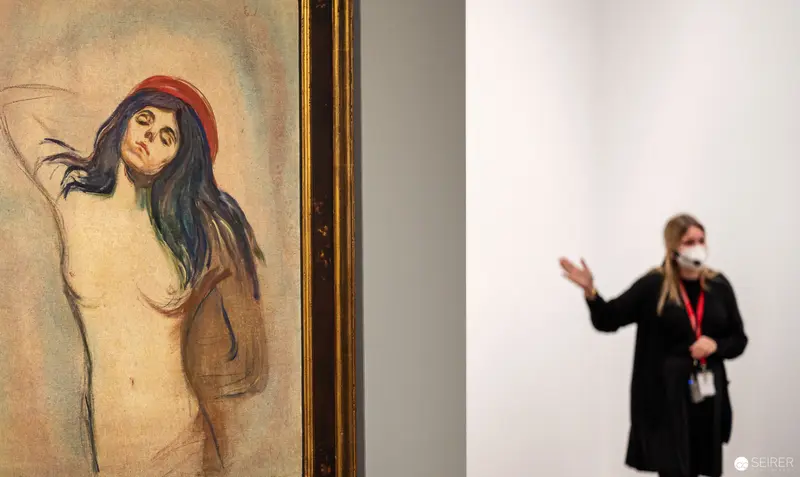 Edvard Munch's Madonna: Sensual Portrayal with Gallery Viewer in Background