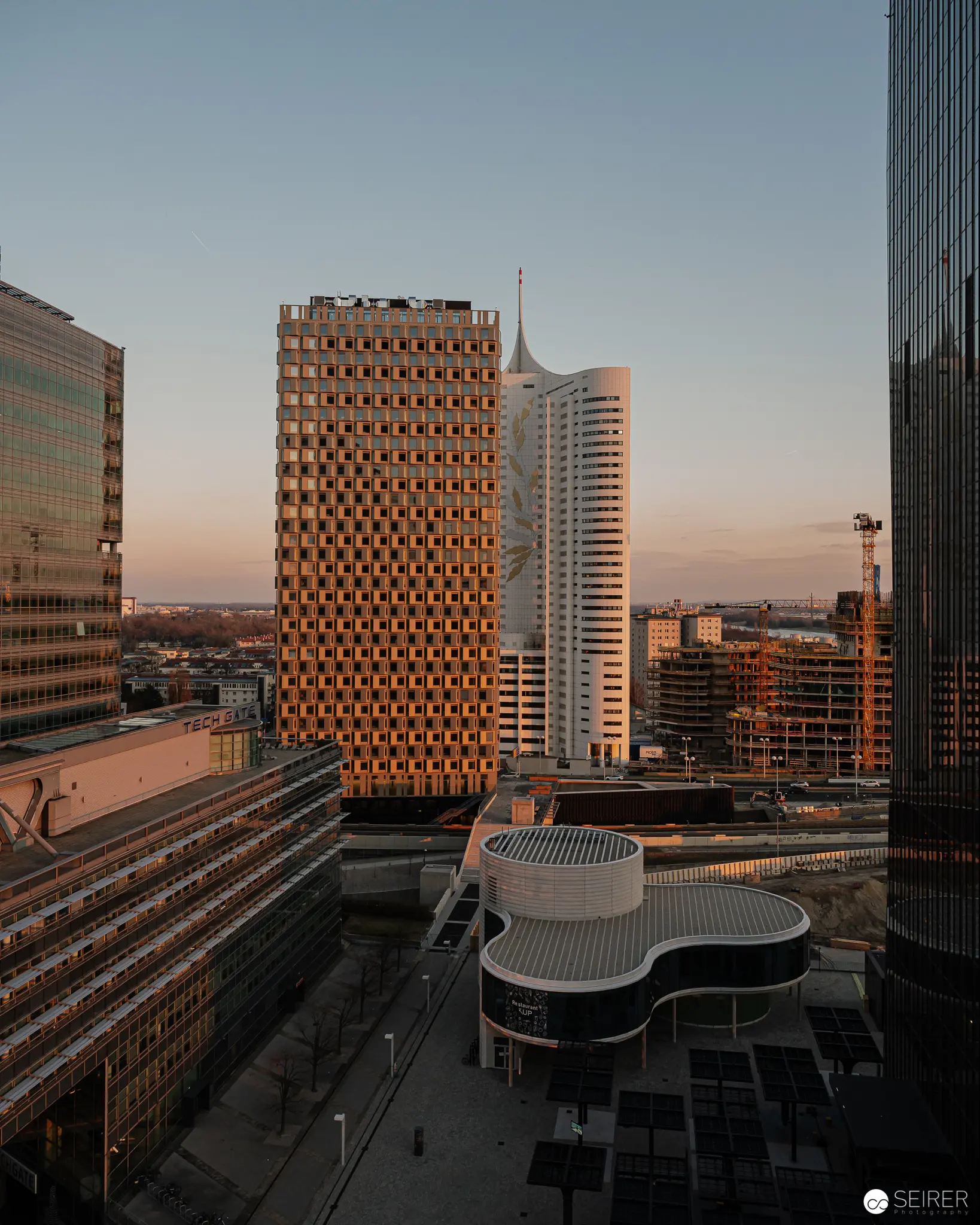 Urban Landscape at Sunset: Modern Architecture in Geometric Harmony