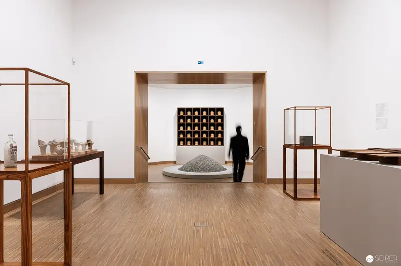 Ai Weiwei Exhibition at Albertina Modern: Minimalist Gallery View with Silhouetted Visitor