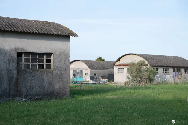 Rural Outbuildings with Corrugated Roofs in Abandoned Agricultural Complex